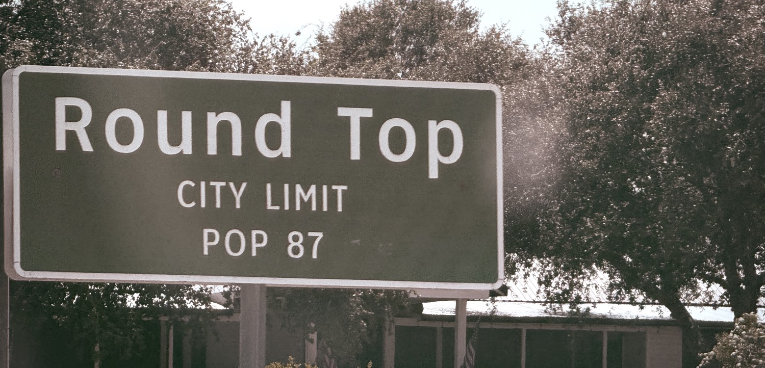 Round Top city limit sign, population 87